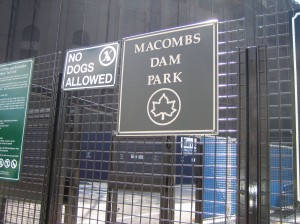 Macombs Dam Park - sign along the walk to the handicapped entrance